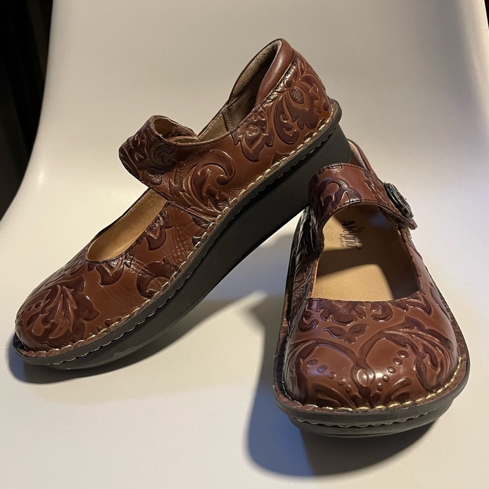 Lightly worn 9.5 alegria wedges real leather embossed